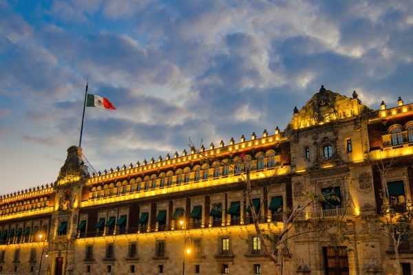 national palace with flag of mexico