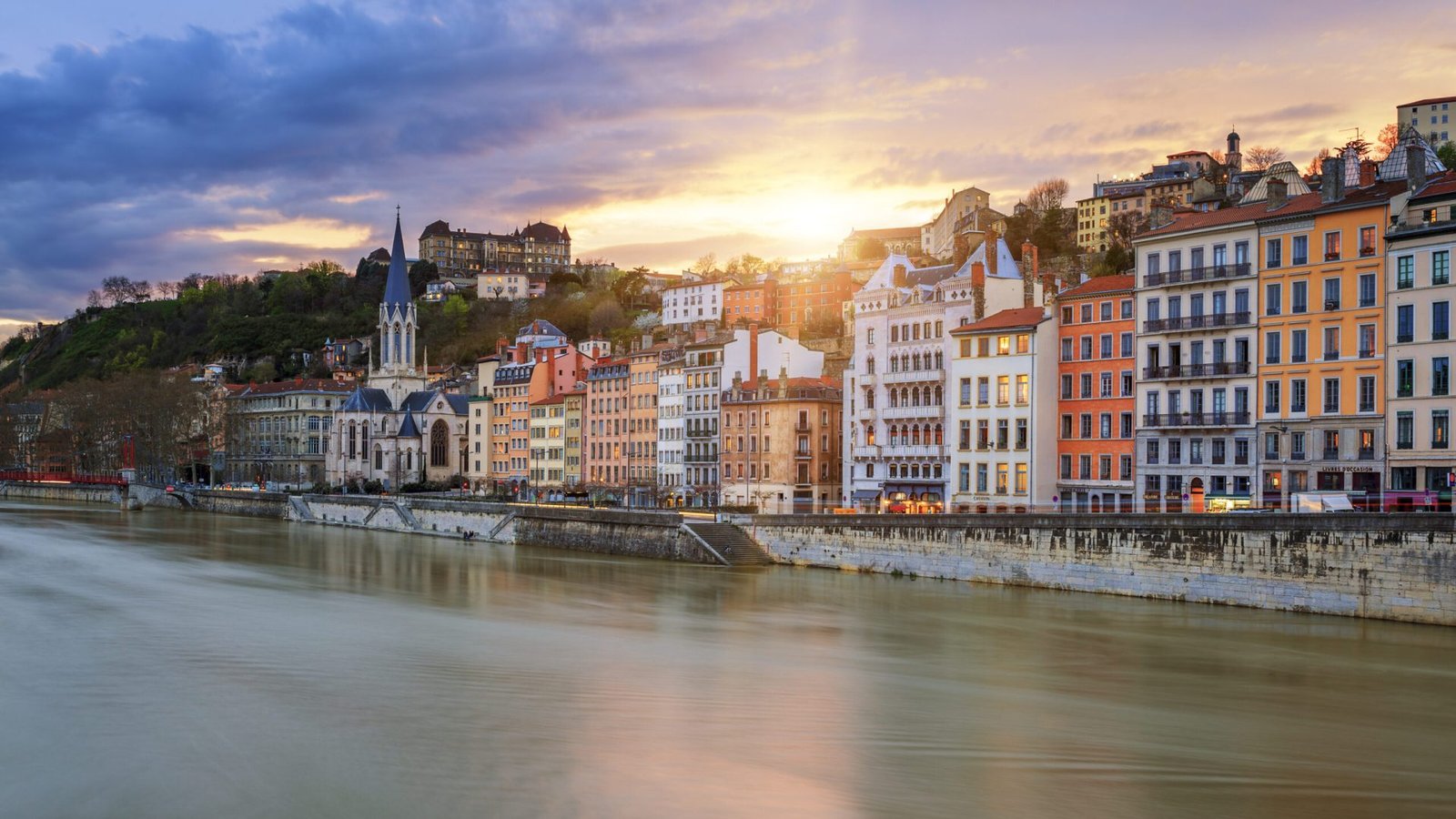 view of saone river in lyon city at sunset